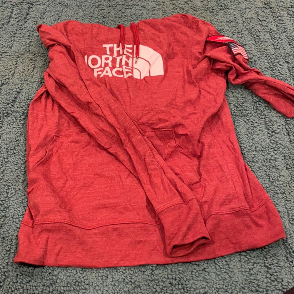 North Face sweatshirt.